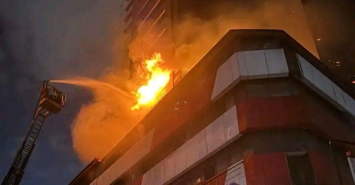 Christmas fire razes 22-storey building, responders battle blaze (VIDEO)